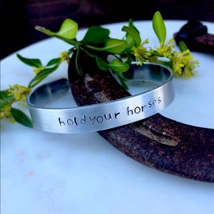Hand stamped bracelet “hold your horses”